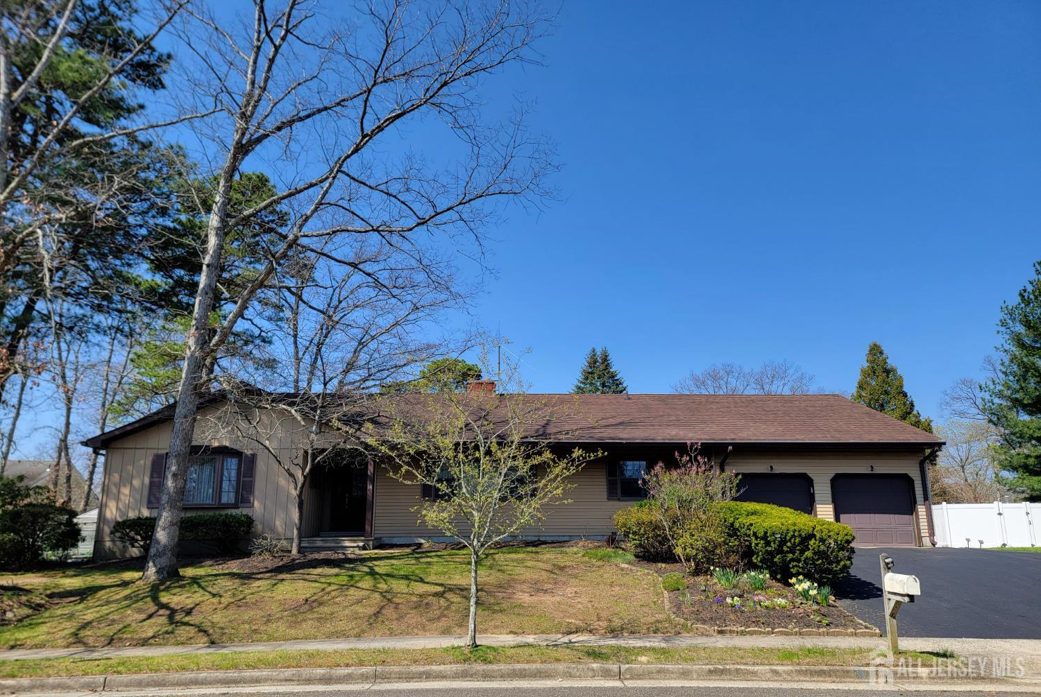 14 Perry Avenue Monroe Township, NJ 08831 - Photo 1 of 37 a front view of a house with garden