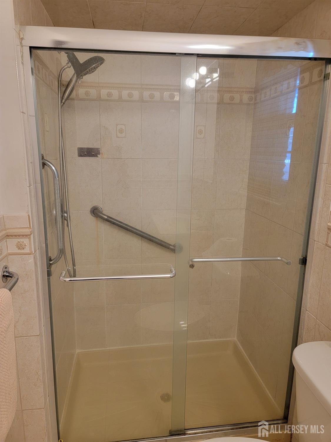 14 Perry Avenue Monroe Township, NJ 08831 - Photo 20 of 37 a bathroom with a shower