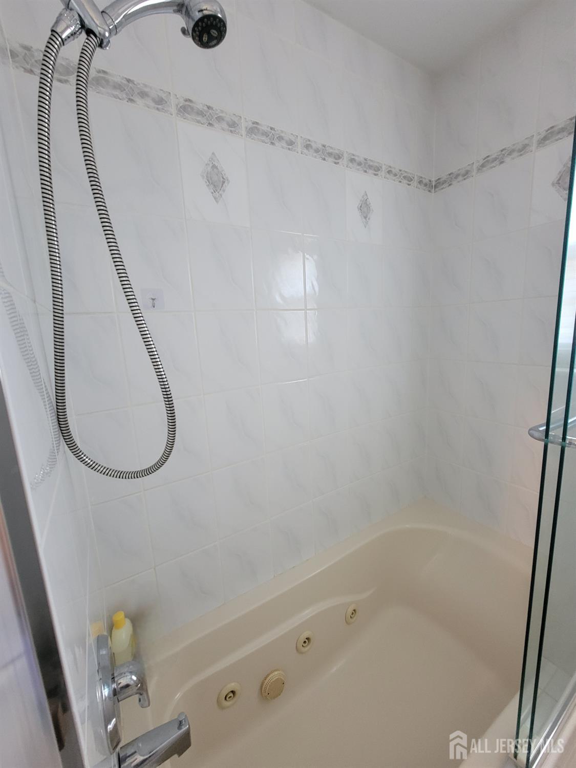 14 Perry Avenue Monroe Township, NJ 08831 - Photo 24 of 37 a bathroom with a bathtub