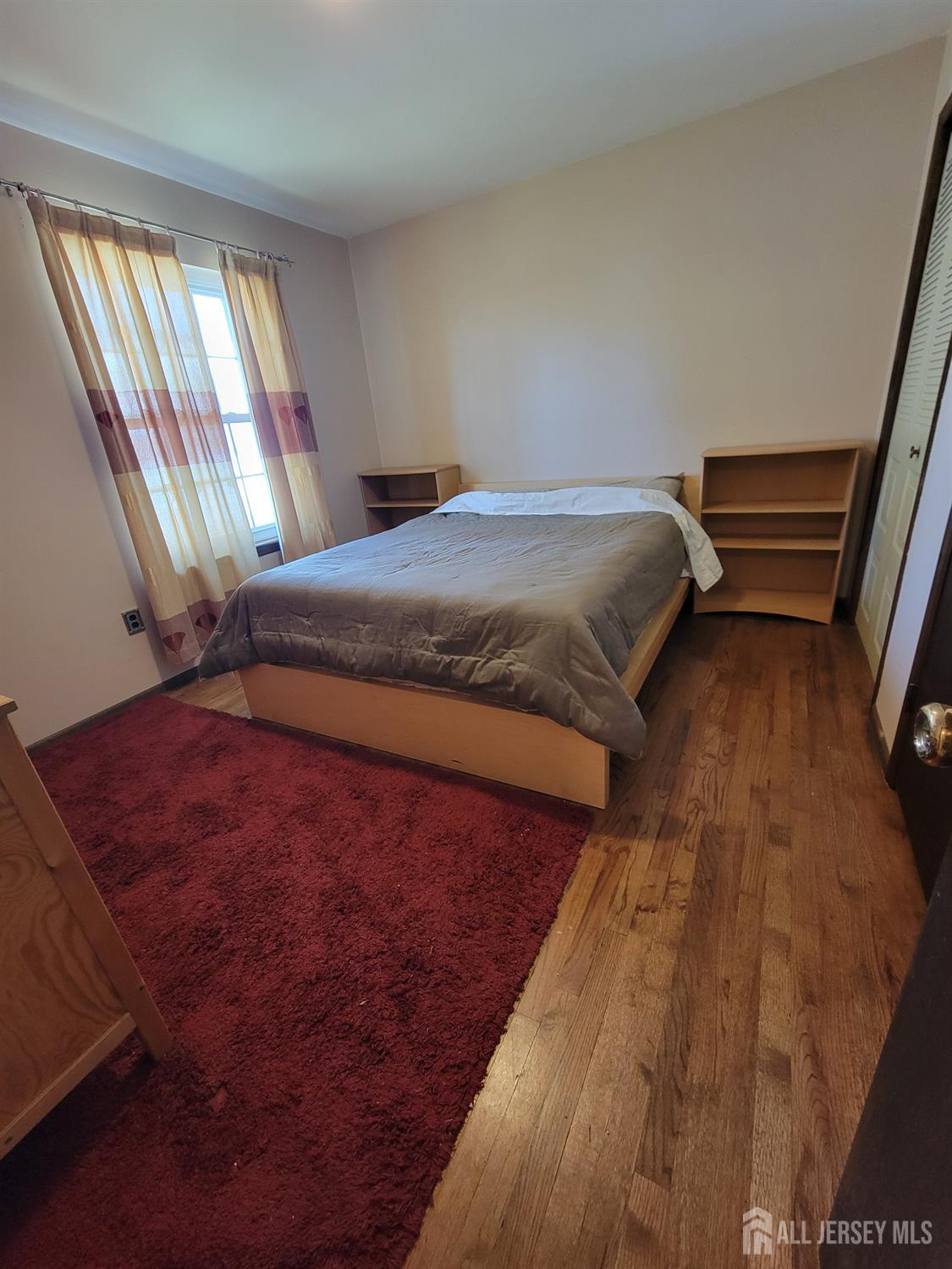 14 Perry Avenue Monroe Township, NJ 08831 - Photo 27 of 37 a bedroom with a bed and window