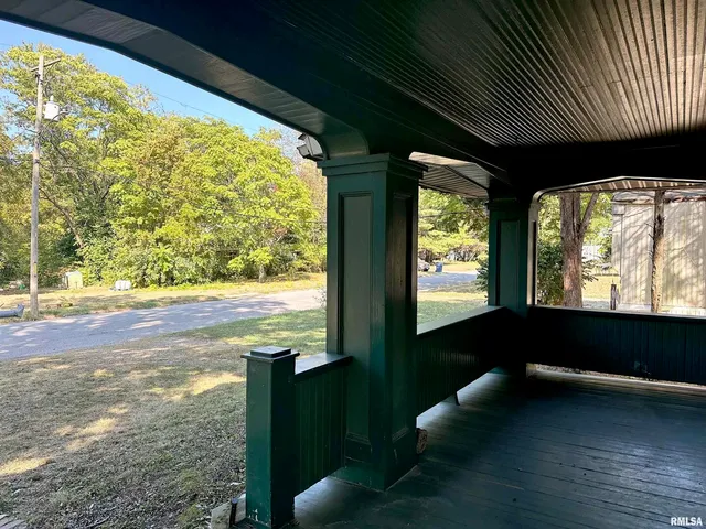 a view of an outdoor space with a tree