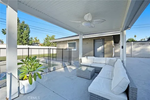 a view of a chairs and tables in the patio