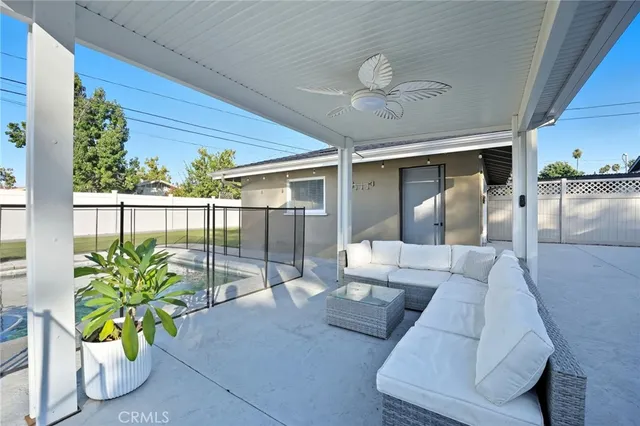 a view of a chairs and tables in the patio