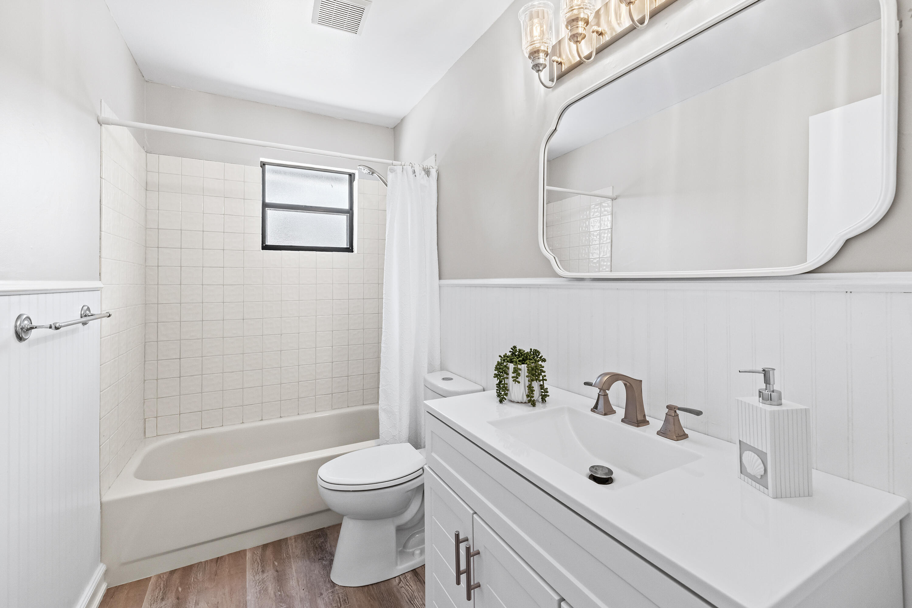 15400 76th Road North Loxahatchee, FL 33470 - Photo 19 of 39 a bathroom with a sink a toilet and shower
