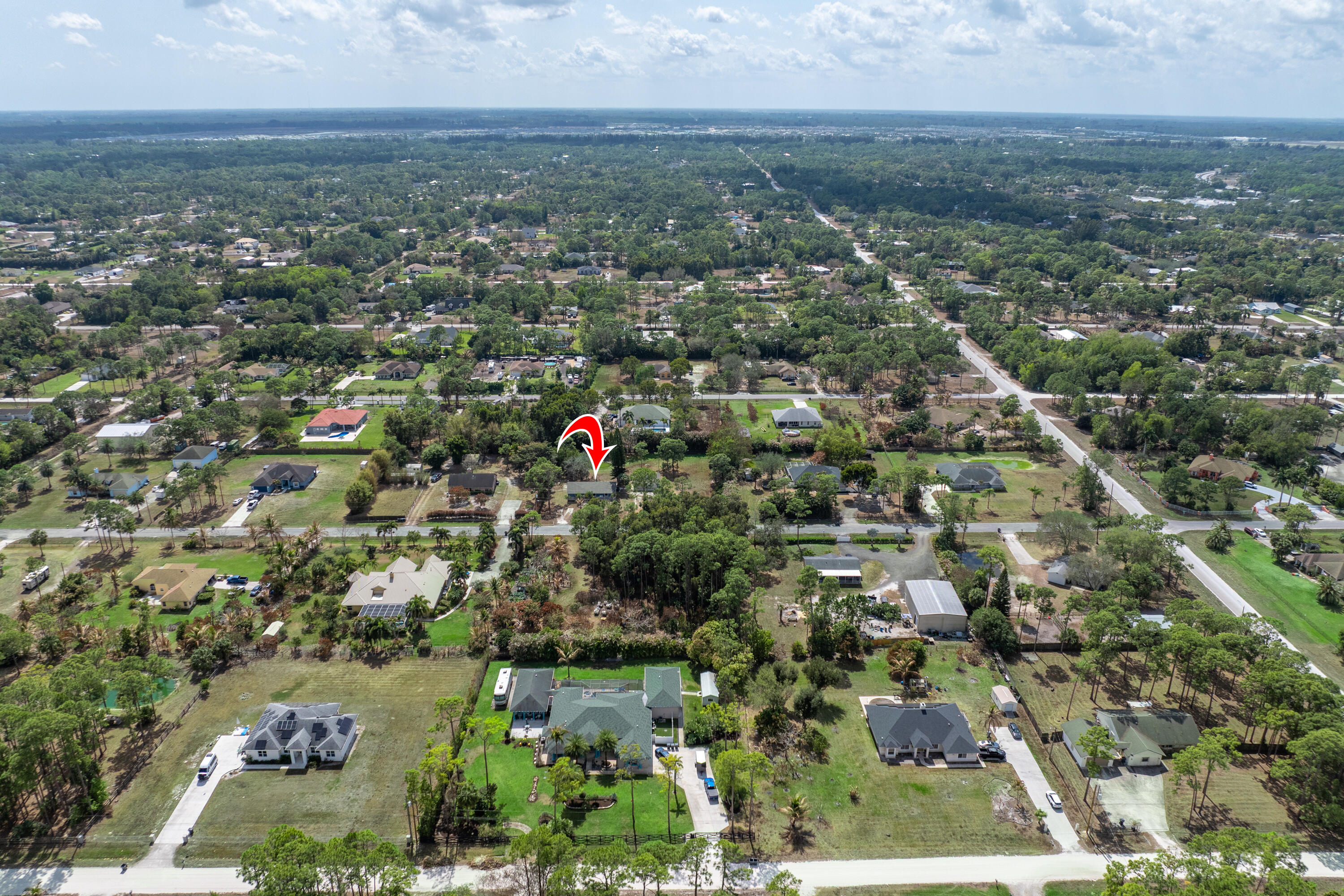 15400 76th Road North Loxahatchee, FL 33470 - Photo 39 of 39 an aerial view of residential houses with city view and lake view