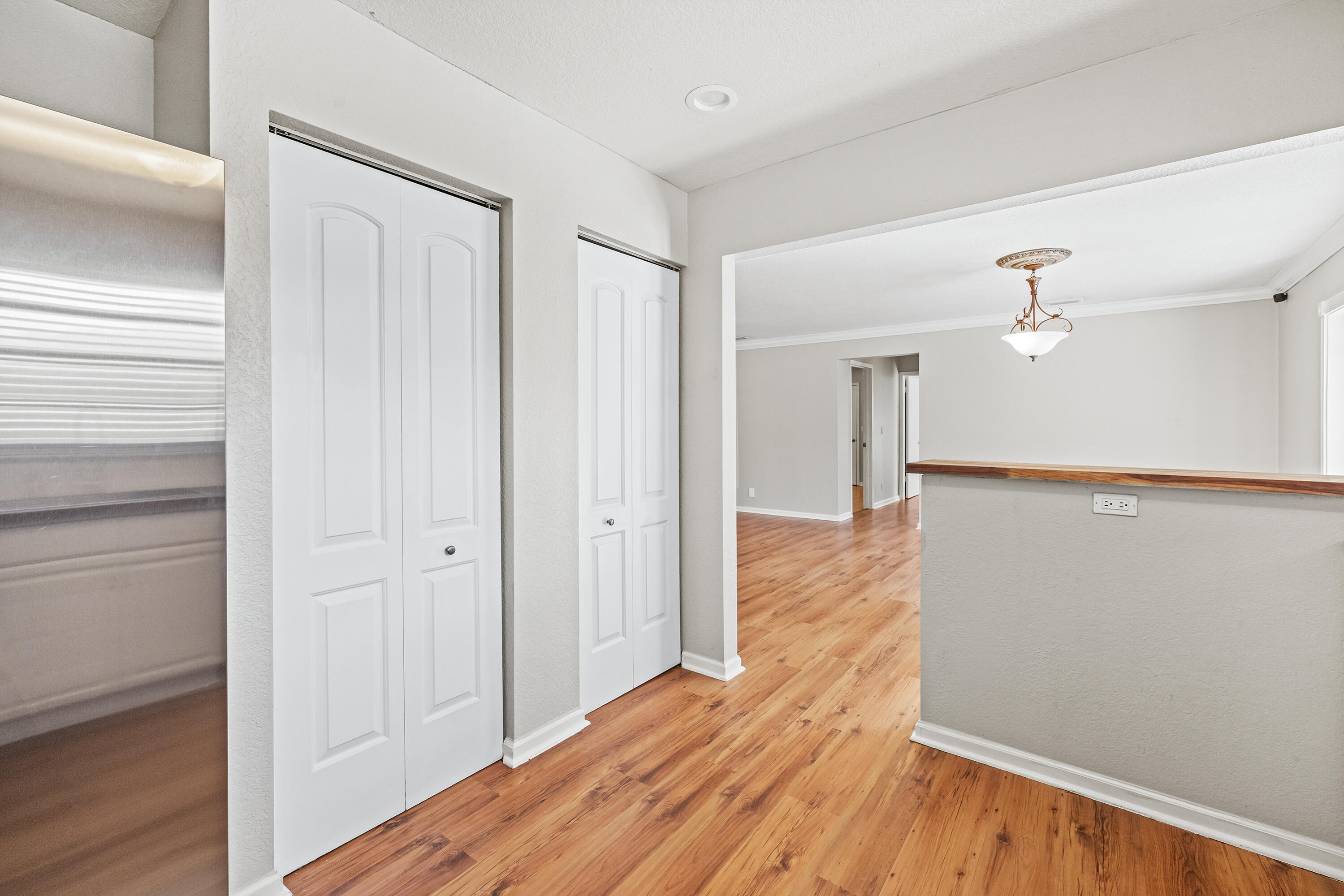 15400 76th Road North Loxahatchee, FL 33470 - Photo 10 of 39 a view of a hallway with wooden floor
