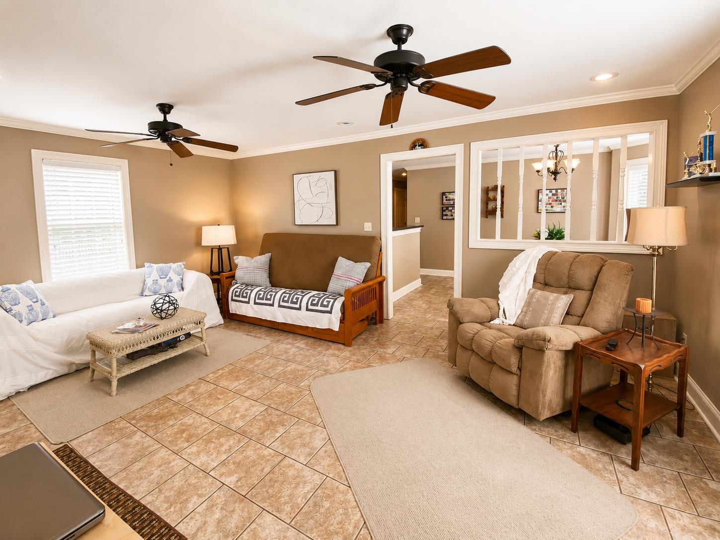 59 Conner Circle Iuka, MS 38852 - Photo 8 of 20 Spacious living area featuring tiled flooring and crown molding