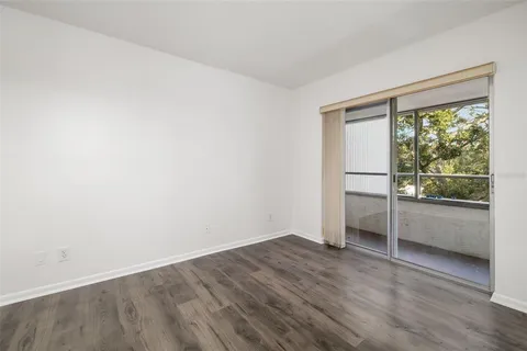 a view of outdoor space with signage and flags