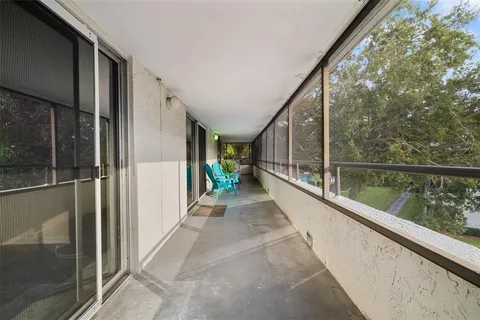 a view of swimming pool with a patio