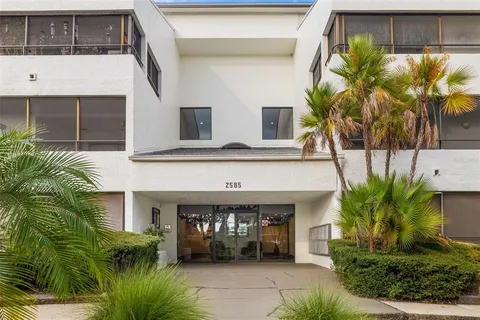 a view of room with wooden floor and window