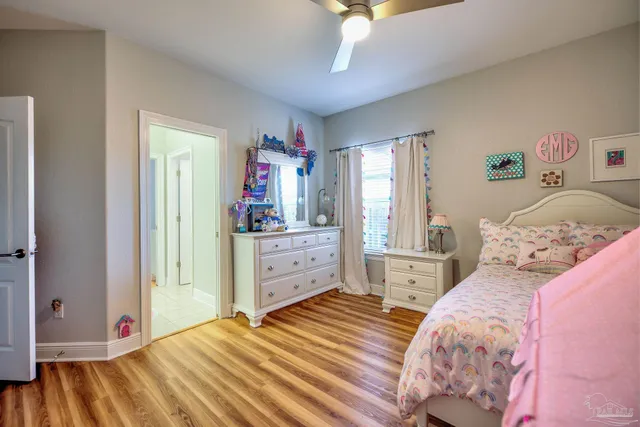 a view of a swimming pool and lounge chair