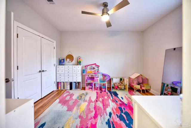 a view of a swimming pool with an outdoor space and seating area