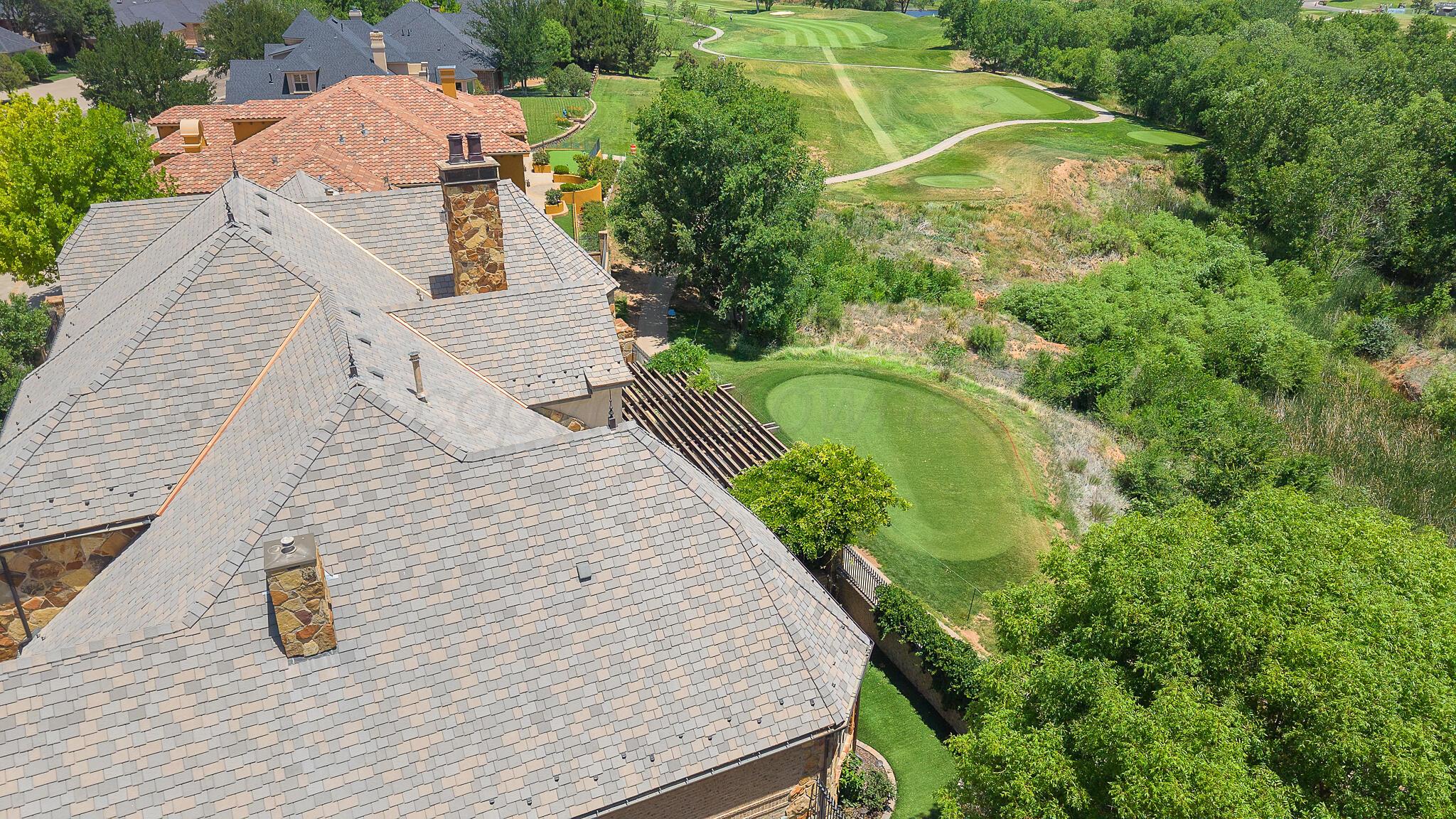 18 Cypress Point Amarillo, TX 79124 - Photo 3 of 95 an aerial view of a house with a yard and trees