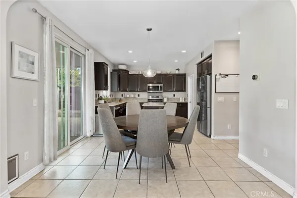 a view of a dining room kitchen and a window