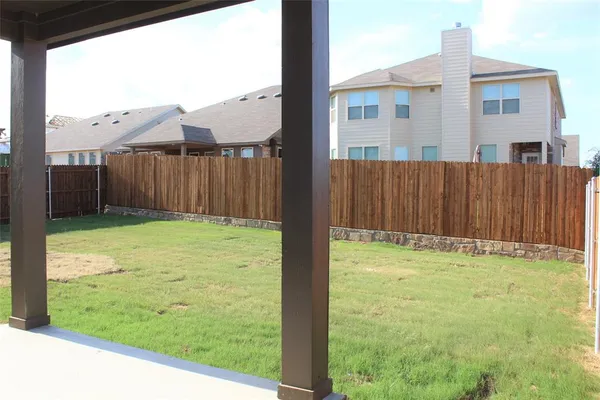 a view of a backyard with a garden