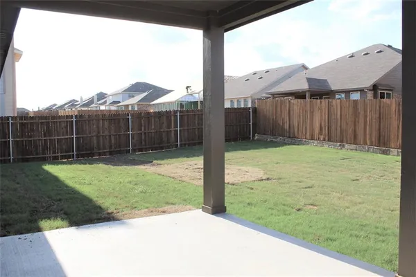 a view of backyard with green space