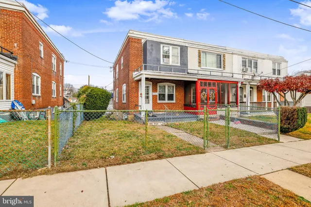 a view of a building with swimming pool