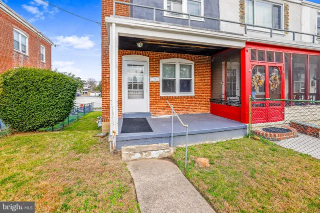 a view of brick building with many windows