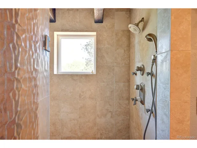 a bathroom with a sink a mirror and a toilet