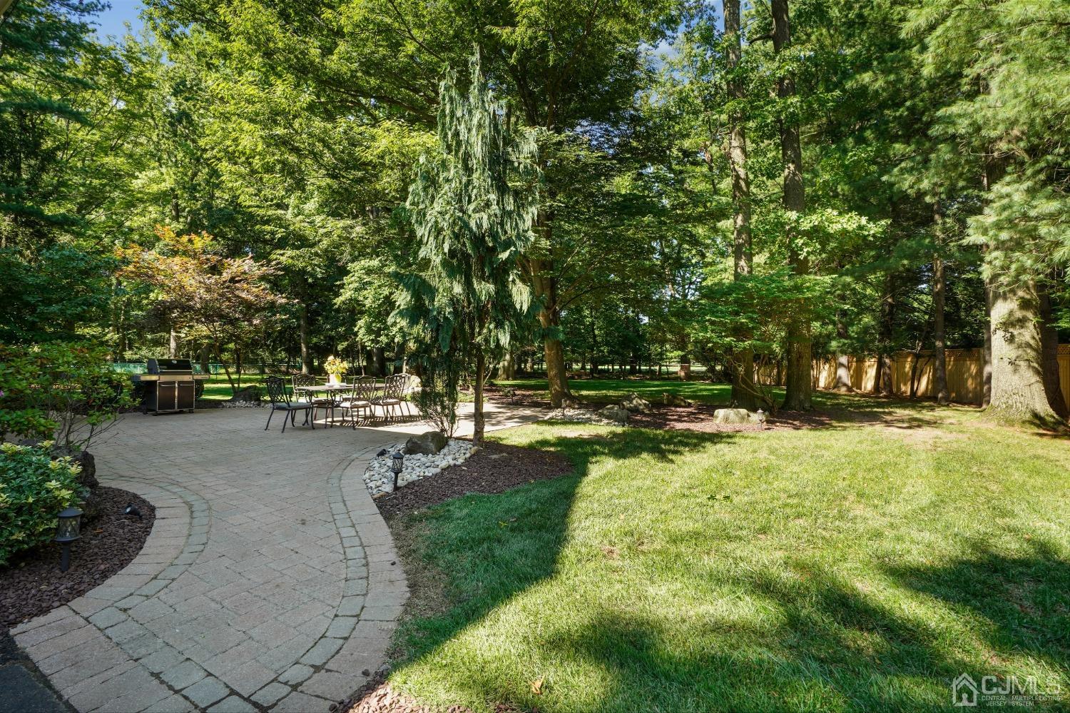 29 Clive Hills Road Edison, NJ 08820 - Photo 27 of 28 a view of backyard with swimming pool
