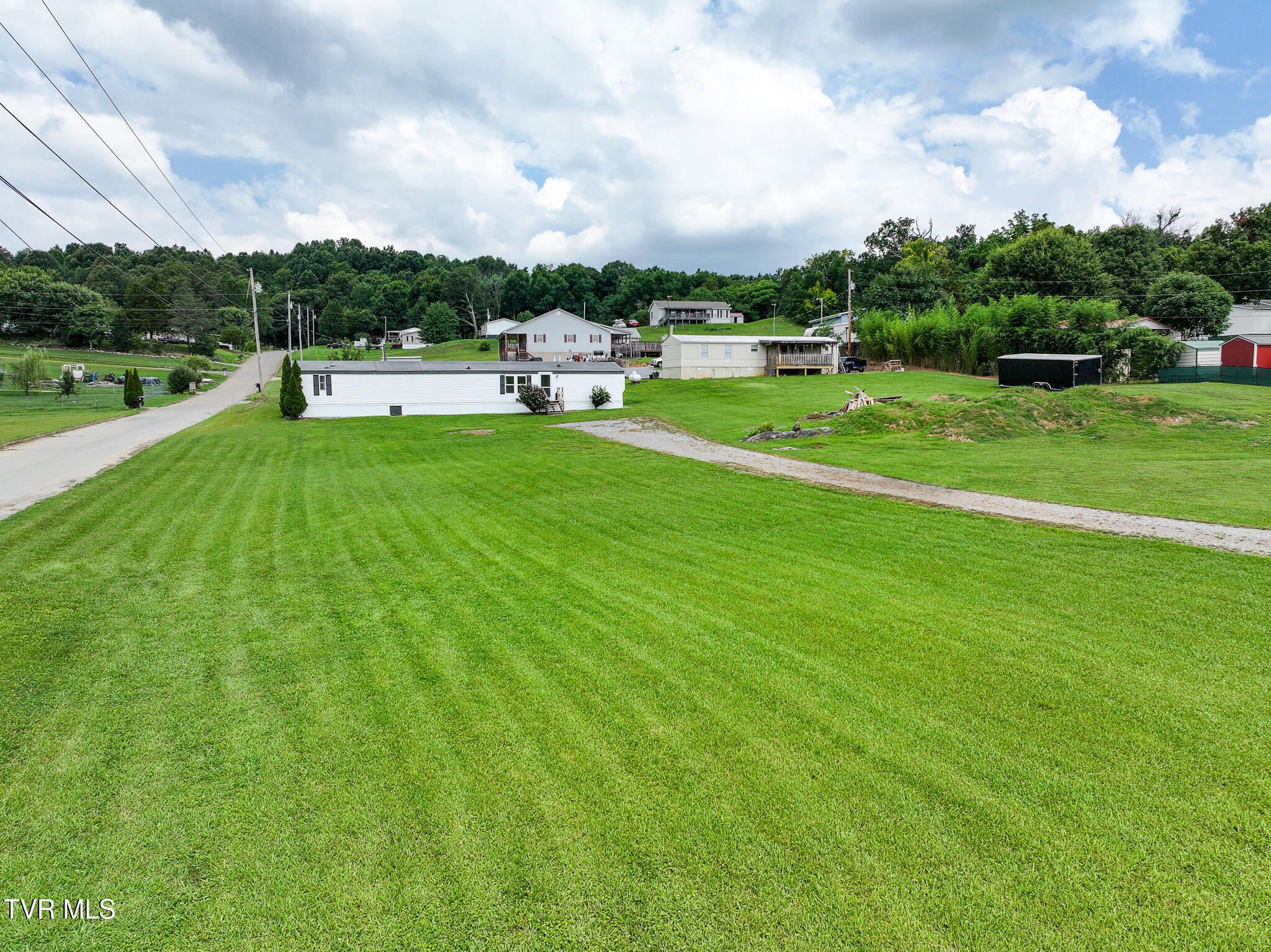1275 Whitehouse Road Greeneville, TN 37745 - Photo 1 of 28 DJI_20250723120510_0140_D-Edit