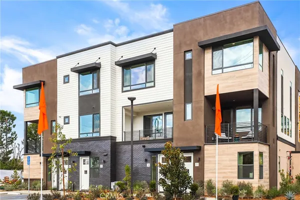 a front view of a multi story residential apartment building