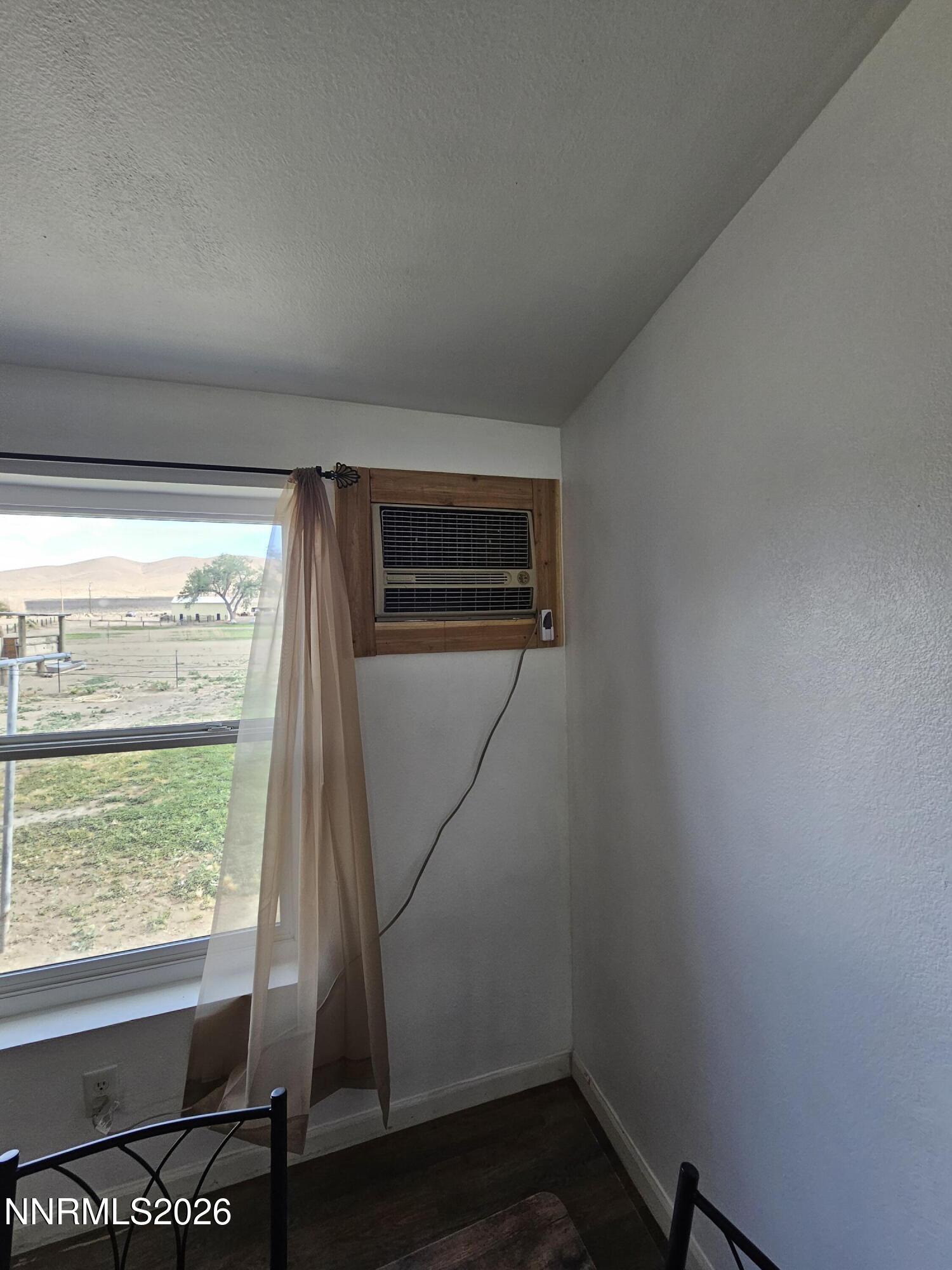 1125 Rancho Road Fernley, NV 89408 - Photo 16 of 47 a room with a door and a window