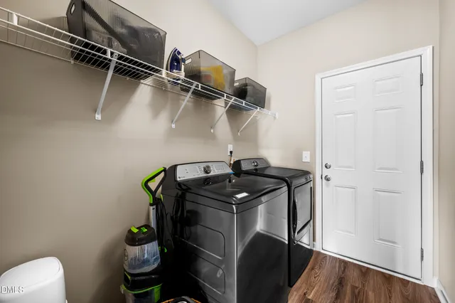 a utility room with dryer and washer