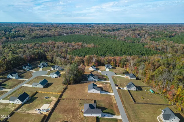 an aerial view of a city with lots of residential buildings