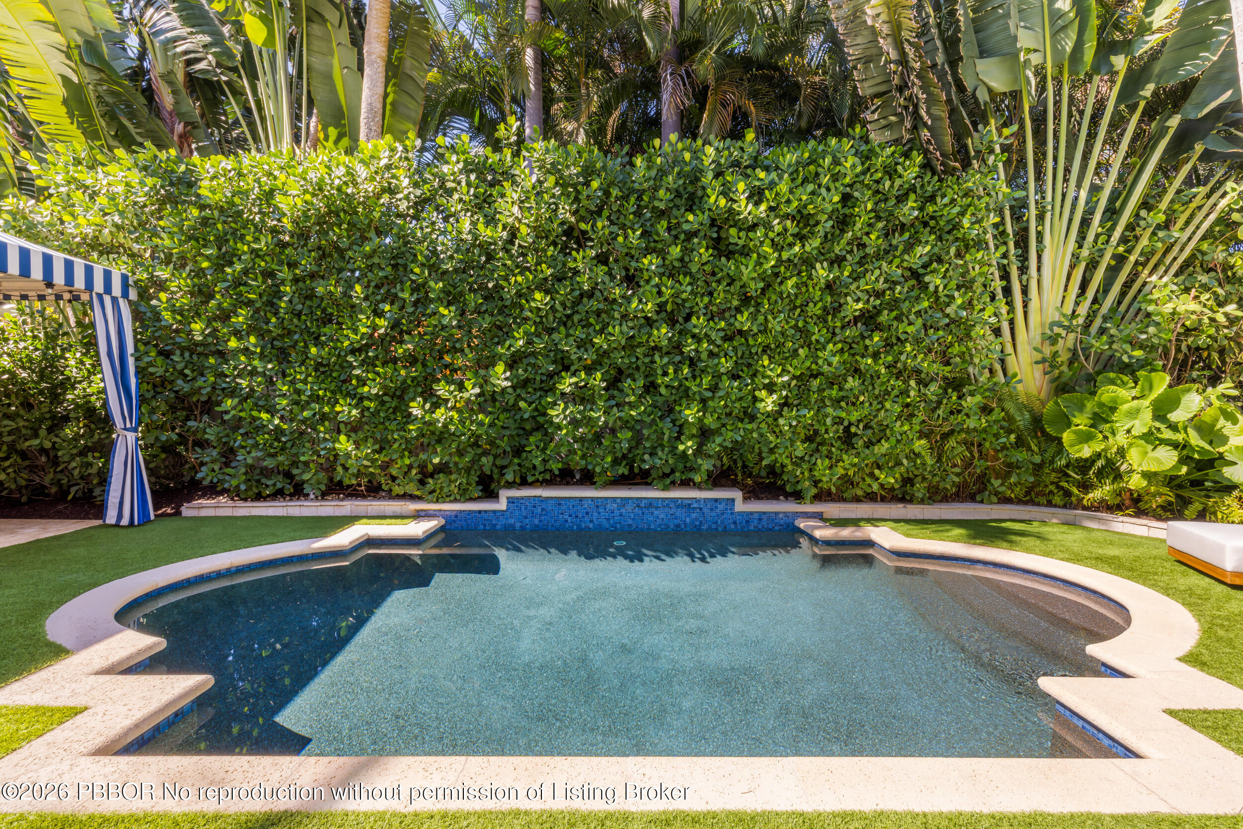 121 Seville Road West Palm Beach, FL 33405 - Photo 58 of 67 a view of swimming pool with a yard