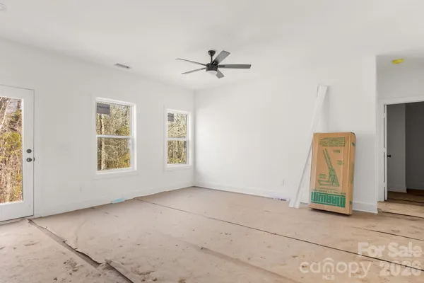 an empty room with windows