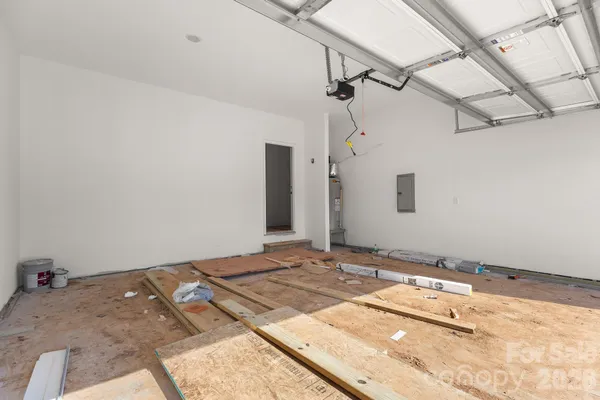 a view of a room with a bedroom