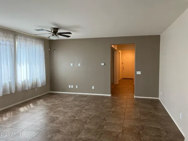 a view of an empty room and window