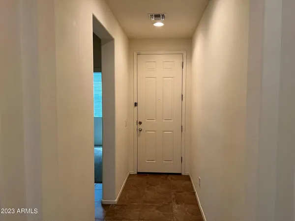 a view of hallway with closet