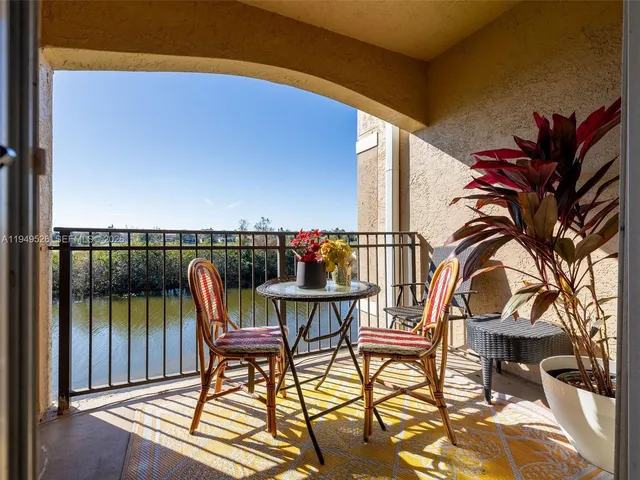 a view of a chairs and table on the terrace