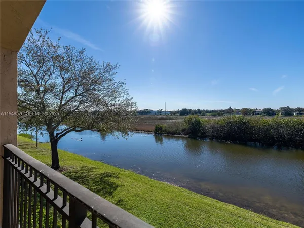 a view of a lake from a balcony