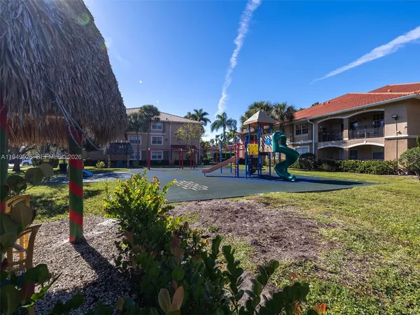 a view of a big yard next to a building