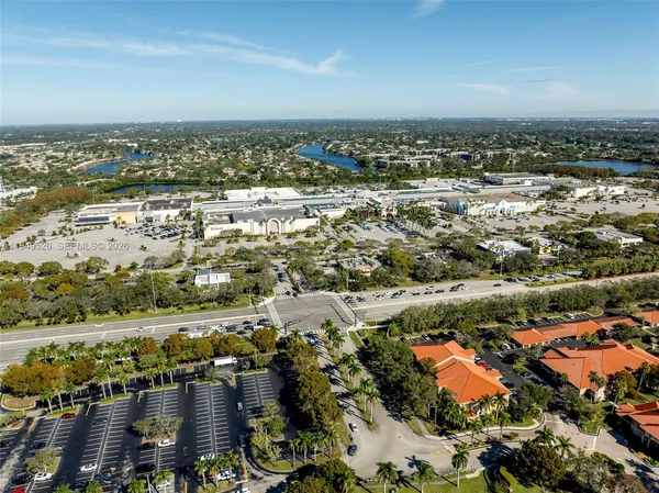 an aerial view of residential building and ocean