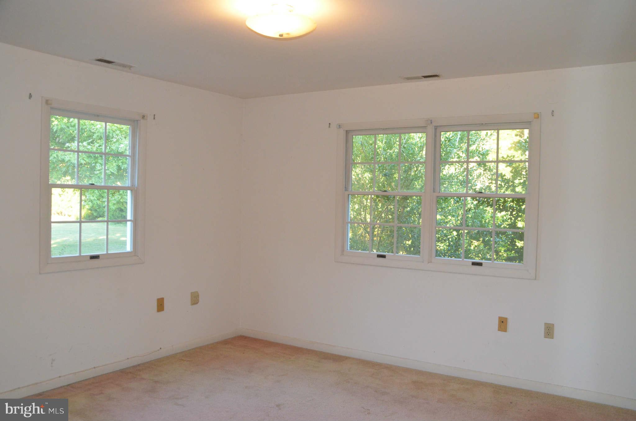 6922 Thorneton Road St. Michaels, MD 21663 - Photo 20 of 26 an empty room with a window