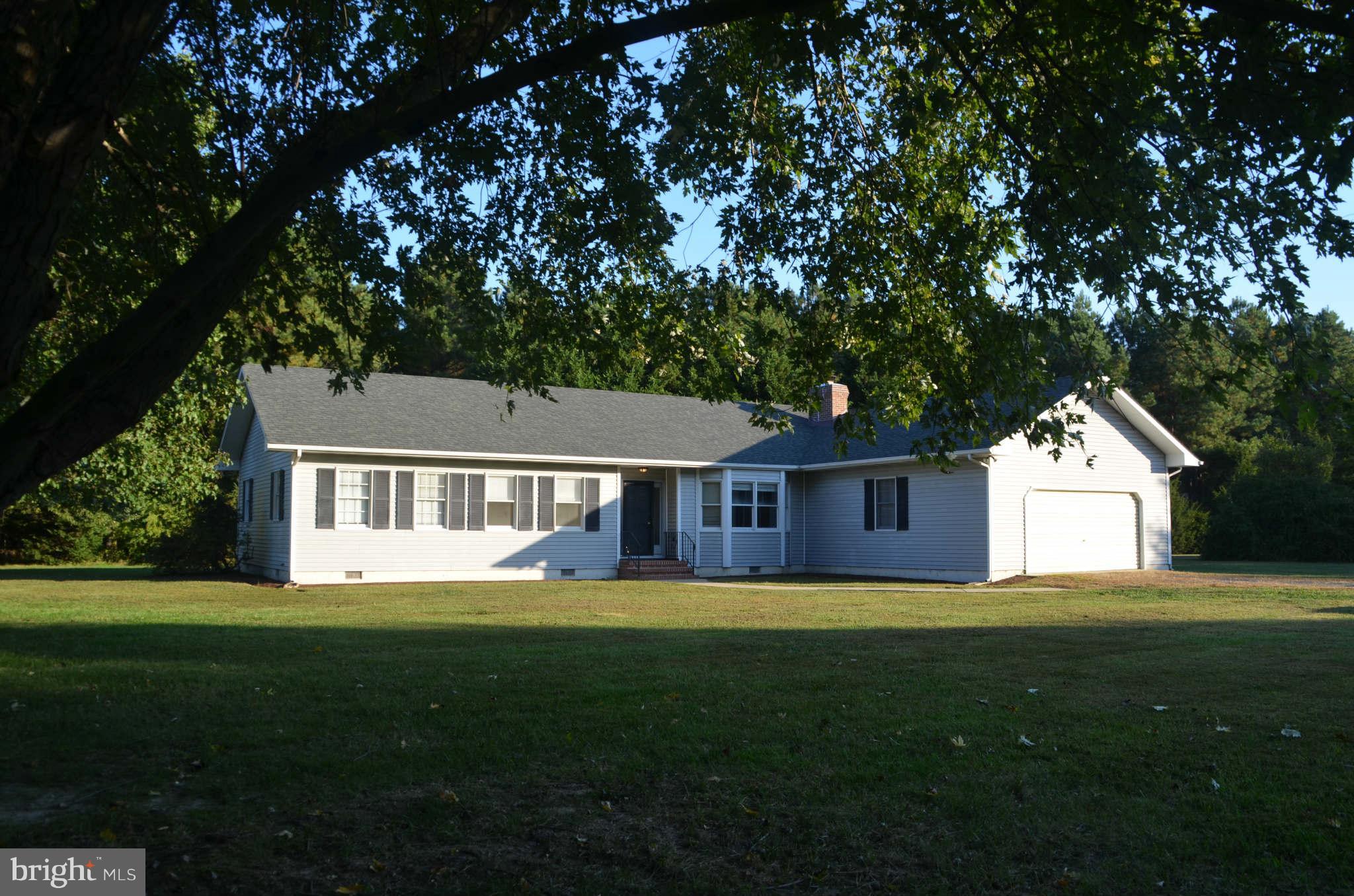 6922 Thorneton Road St. Michaels, MD 21663 - Photo 25 of 26 a front view of house with yard and green space