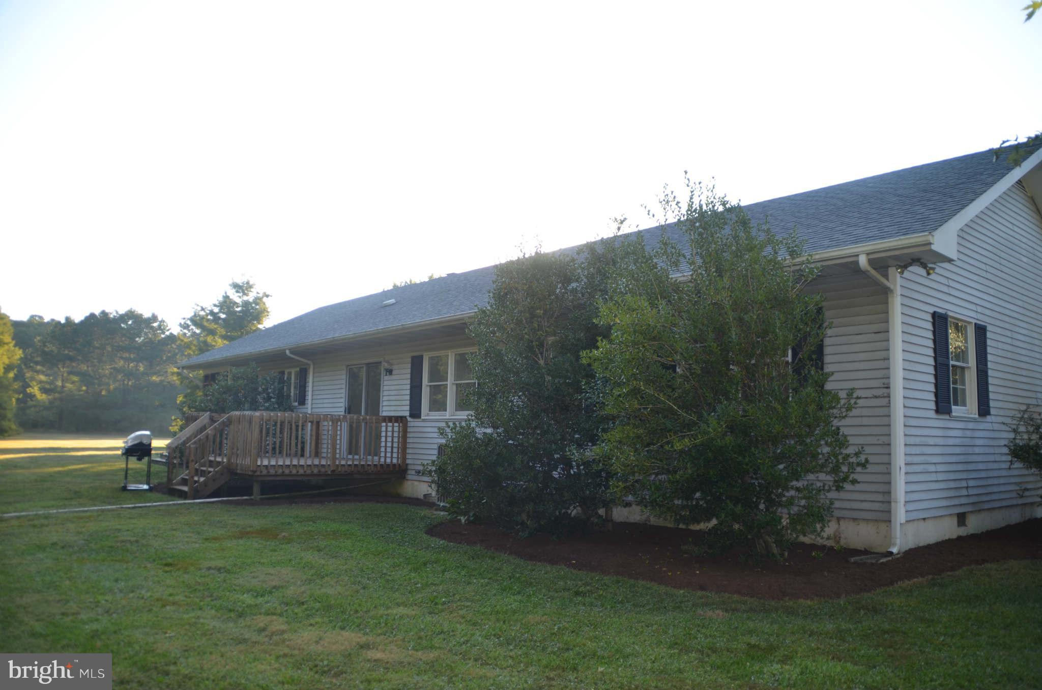 6922 Thorneton Road St. Michaels, MD 21663 - Photo 5 of 26 a view of a house with a yard