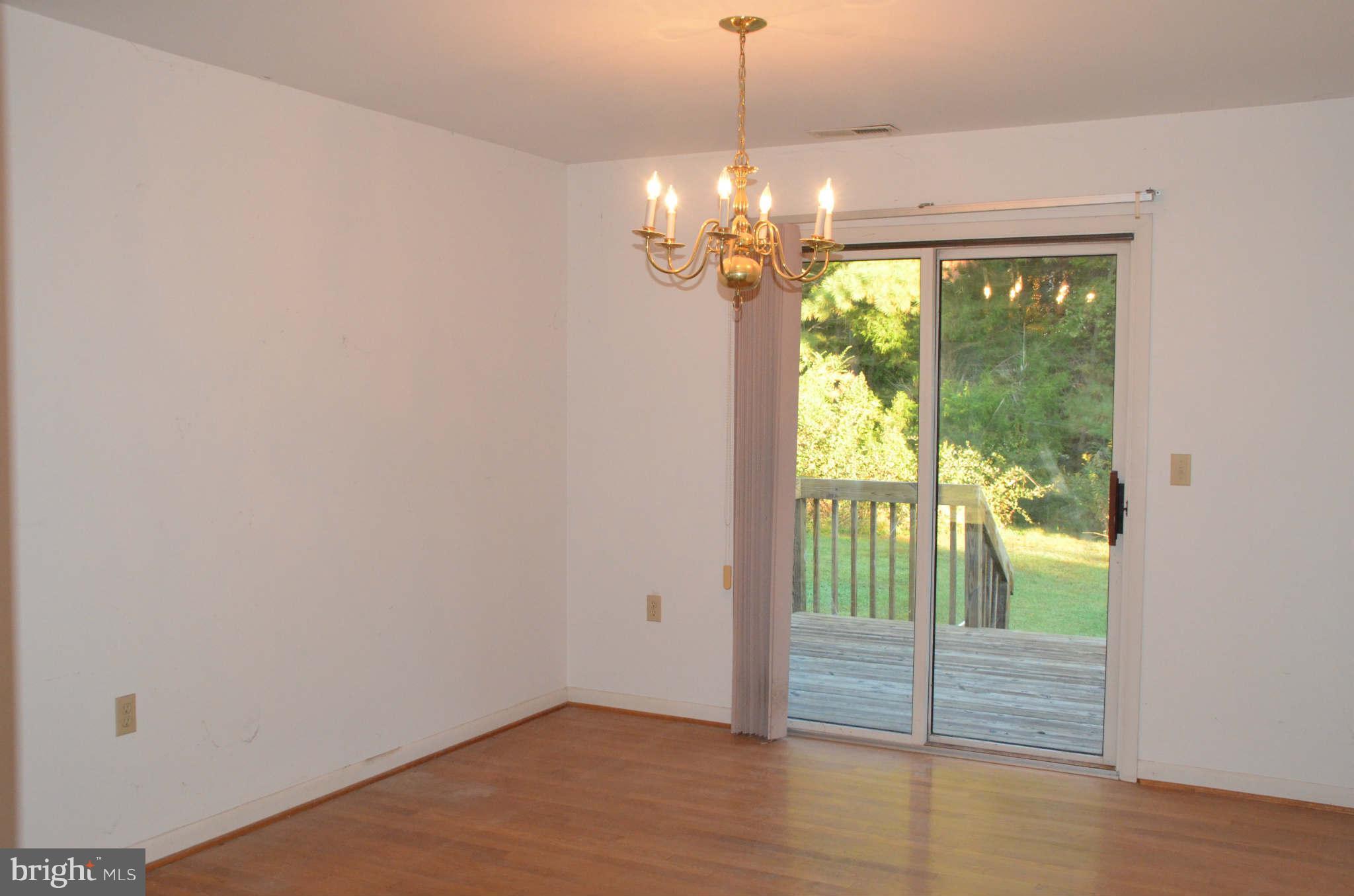 6922 Thorneton Road St. Michaels, MD 21663 - Photo 10 of 26 a view of a room with window view and wooden floor