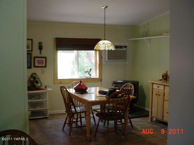 3240 Rosenkranz Road Tieton, WA 98947 - Photo 13 of 14 a dining room with furniture and window