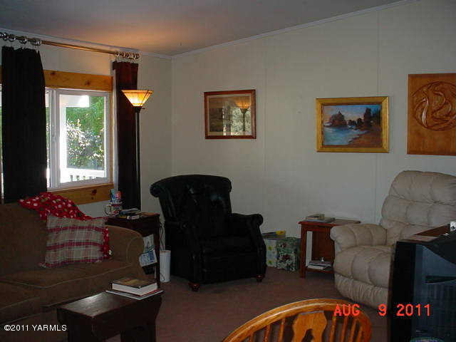 3240 Rosenkranz Road Tieton, WA 98947 - Photo 7 of 14 a living room with furniture and a large window
