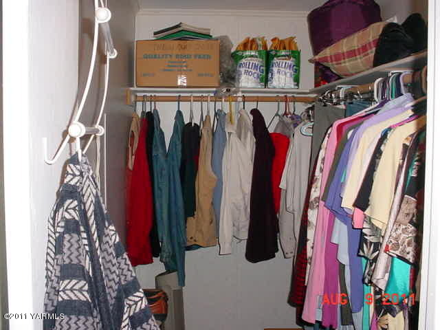 3240 Rosenkranz Road Tieton, WA 98947 - Photo 9 of 14 a view of walk in closet with clothes and shoes
