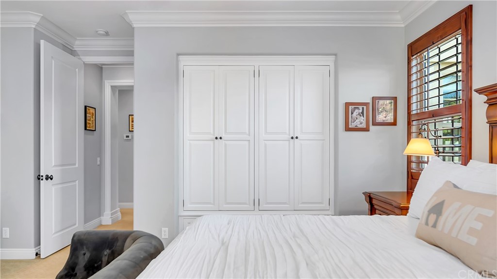 3 Adele Street Ladera Ranch, CA 92694 - Photo 12 of 42 a bedroom with a bed and a couch