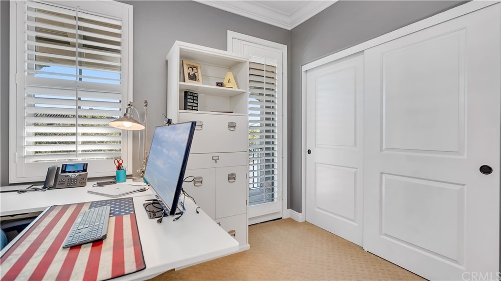 3 Adele Street Ladera Ranch, CA 92694 - Photo 17 of 42 This bedroom is being used as an office. Notice the door to the balcony--for when you need a break.