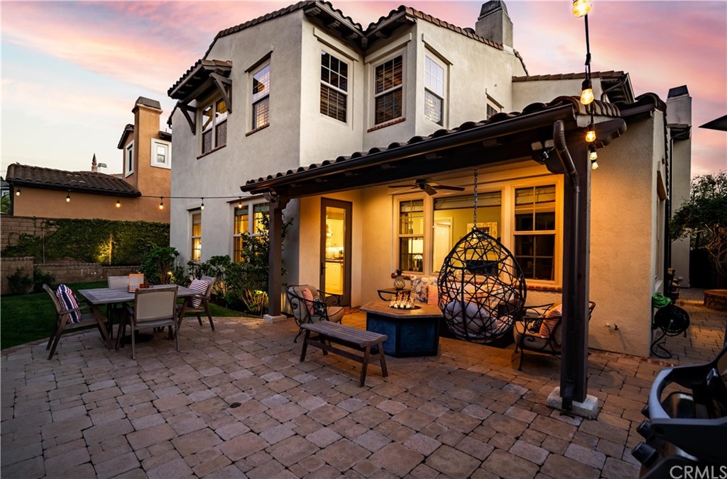 3 Adele Street Ladera Ranch, CA 92694 - Photo 27 of 42 Pavers cover this area and notice the table for alfresco dining.