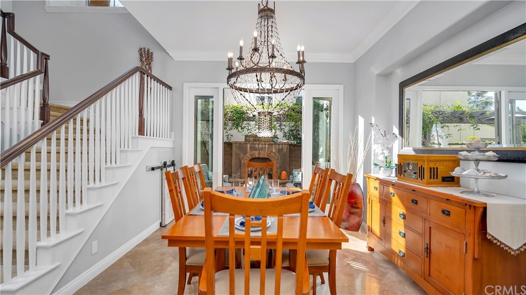 3 Adele Street Ladera Ranch, CA 92694 - Photo 36 of 42 a view of a dining room with furniture window and outside view