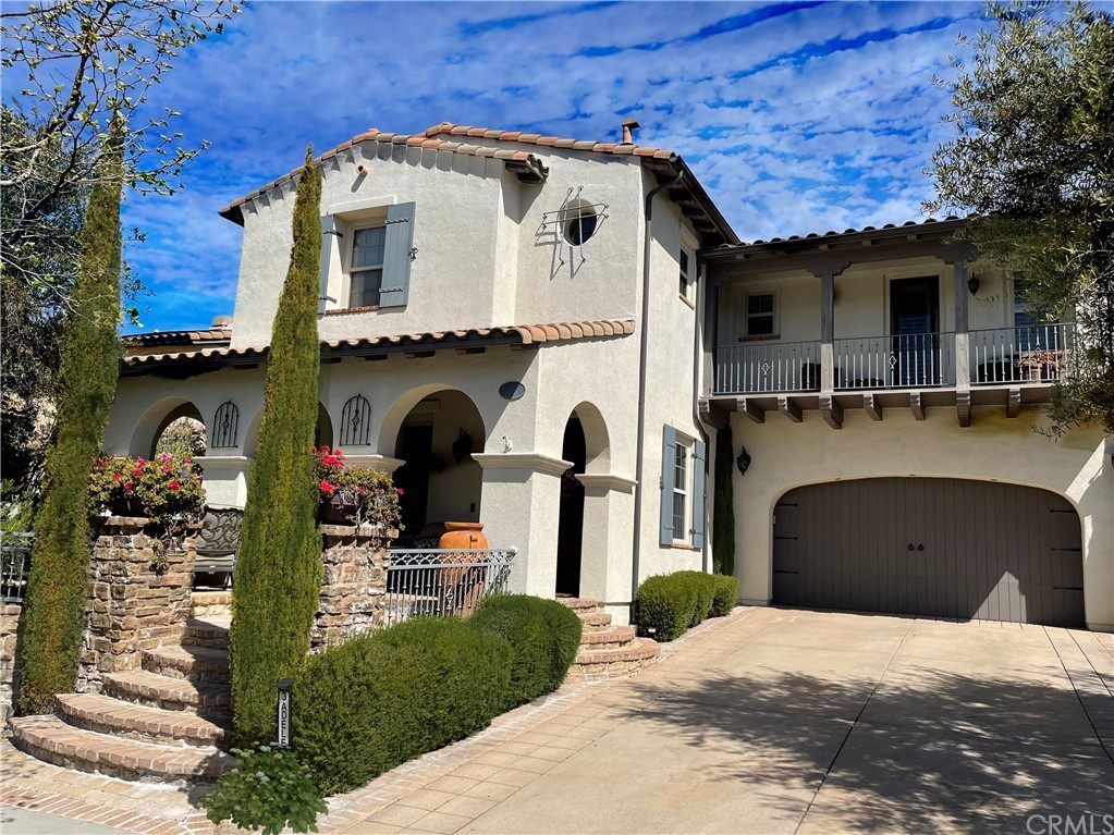 3 Adele Street Ladera Ranch, CA 92694 - Photo 38 of 42 a front view of a house with a garden